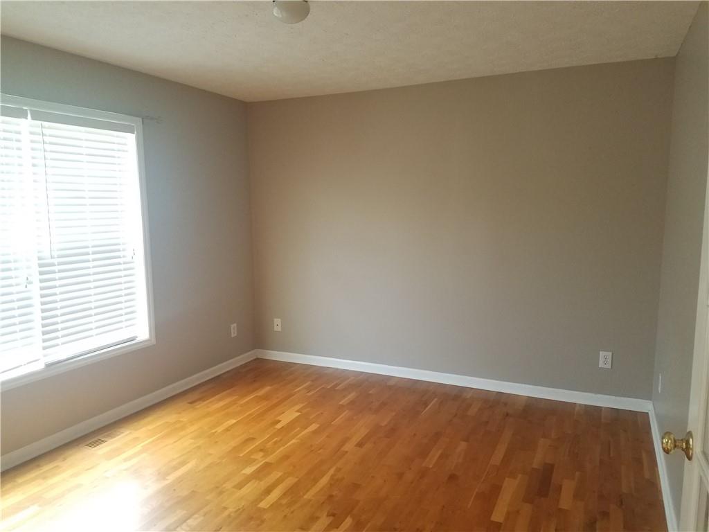 200 Jacksons Run Morganton, NC 28655 - Photo 4 of 7 an empty room with a window