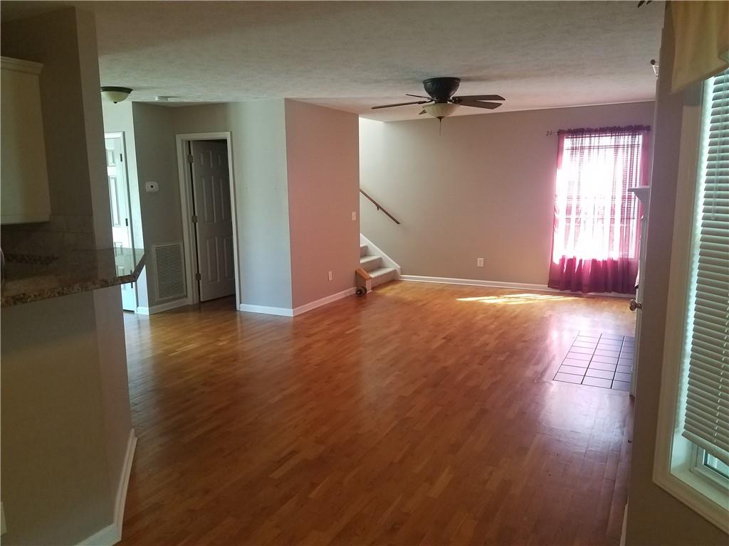 200 Jacksons Run Morganton, NC 28655 - Photo 6 of 7 an empty room with wooden floor and windows