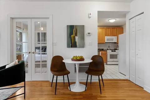 a workspace with furniture and wooden floor