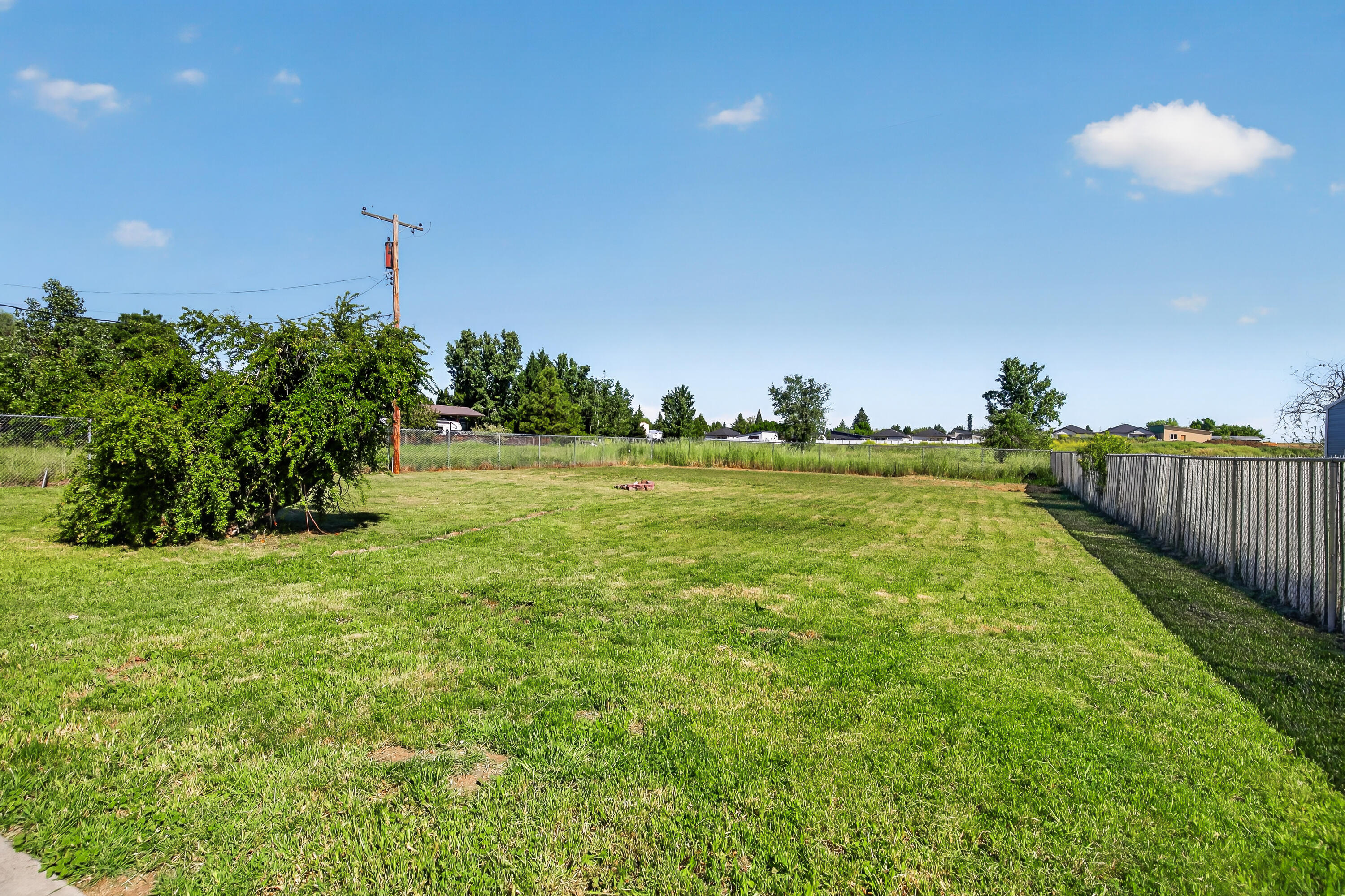 550 Experiment Station Road Medford, OR 97501 - Photo 24 of 27 a view of a golf course with a tree