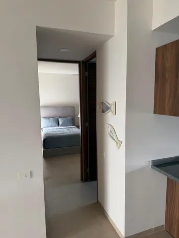 a en suite bathroom with a sink and a mirror