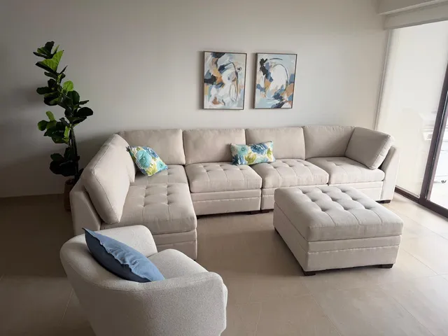 a living room with furniture and a couch