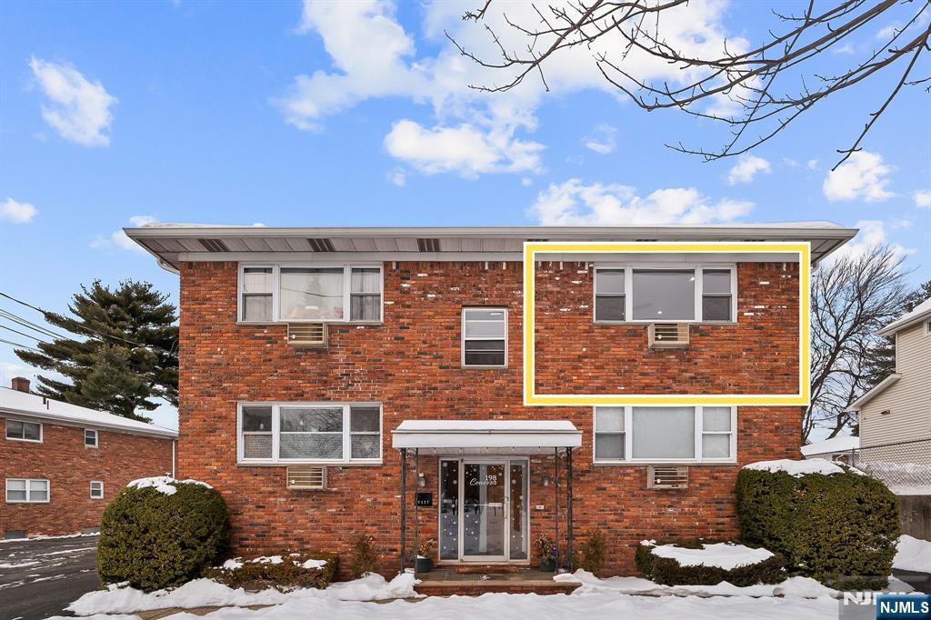 198 Conover Avenue, Unit 4 Nutley, NJ 07110 - Photo 13 of 17 a front view of a house with a yard
