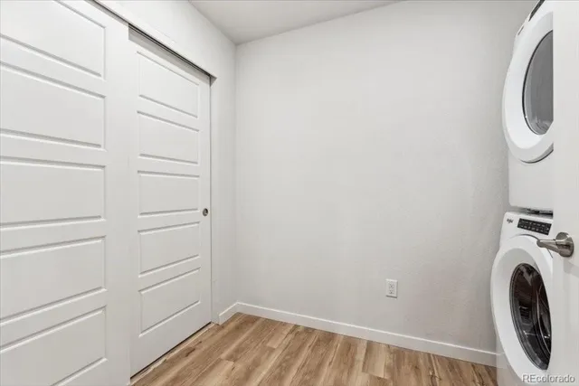 a view of a storage & utility room with a washer dryer