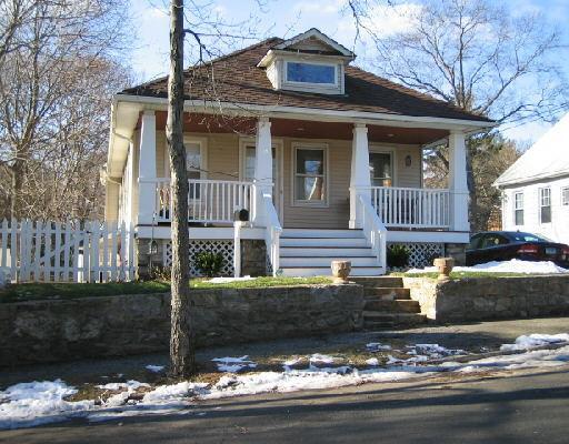 19 Ridgeway Street Stamford, CT 06907 - Photo 1 of 1 a front view of a house with sitting yard