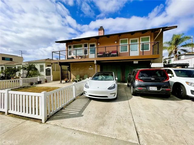 a view of a car park in front of a building