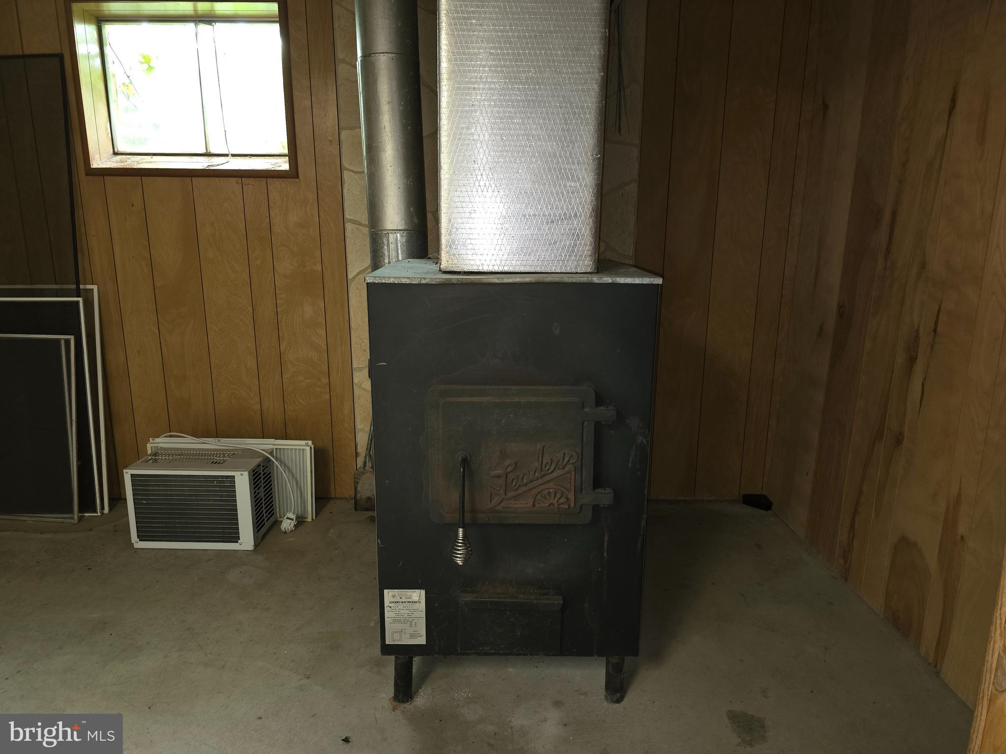 6752 Winchester Grade Road Berkeley Springs, WV 25411 - Photo 31 of 51 Woodstove in basement