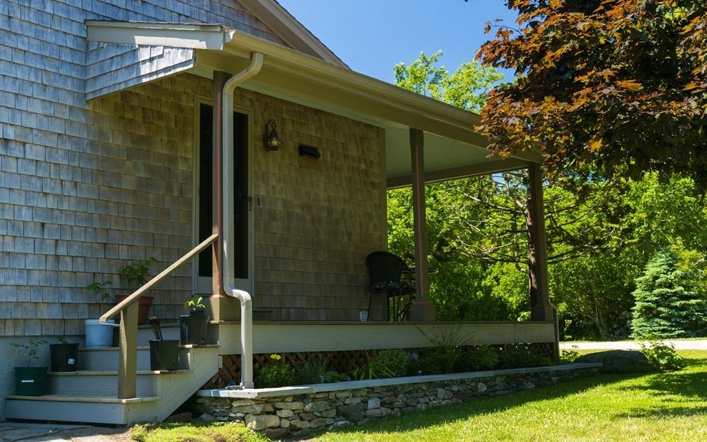16 B Mullin Hill Road, Unit B Little Compton, RI 02837 - Photo 3 of 19 a view of a house with a yard