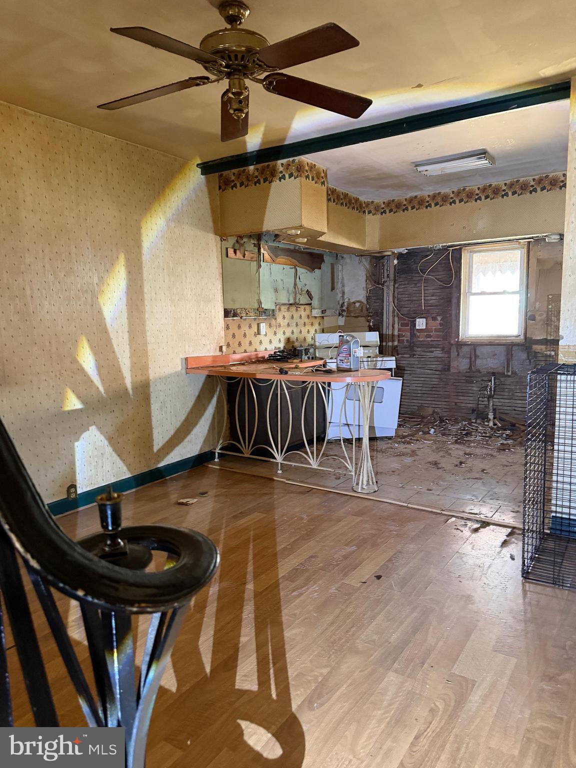 2373 Duncan Street Philadelphia, PA 19124 - Photo 4 of 15 a dining room with a large window and chairs