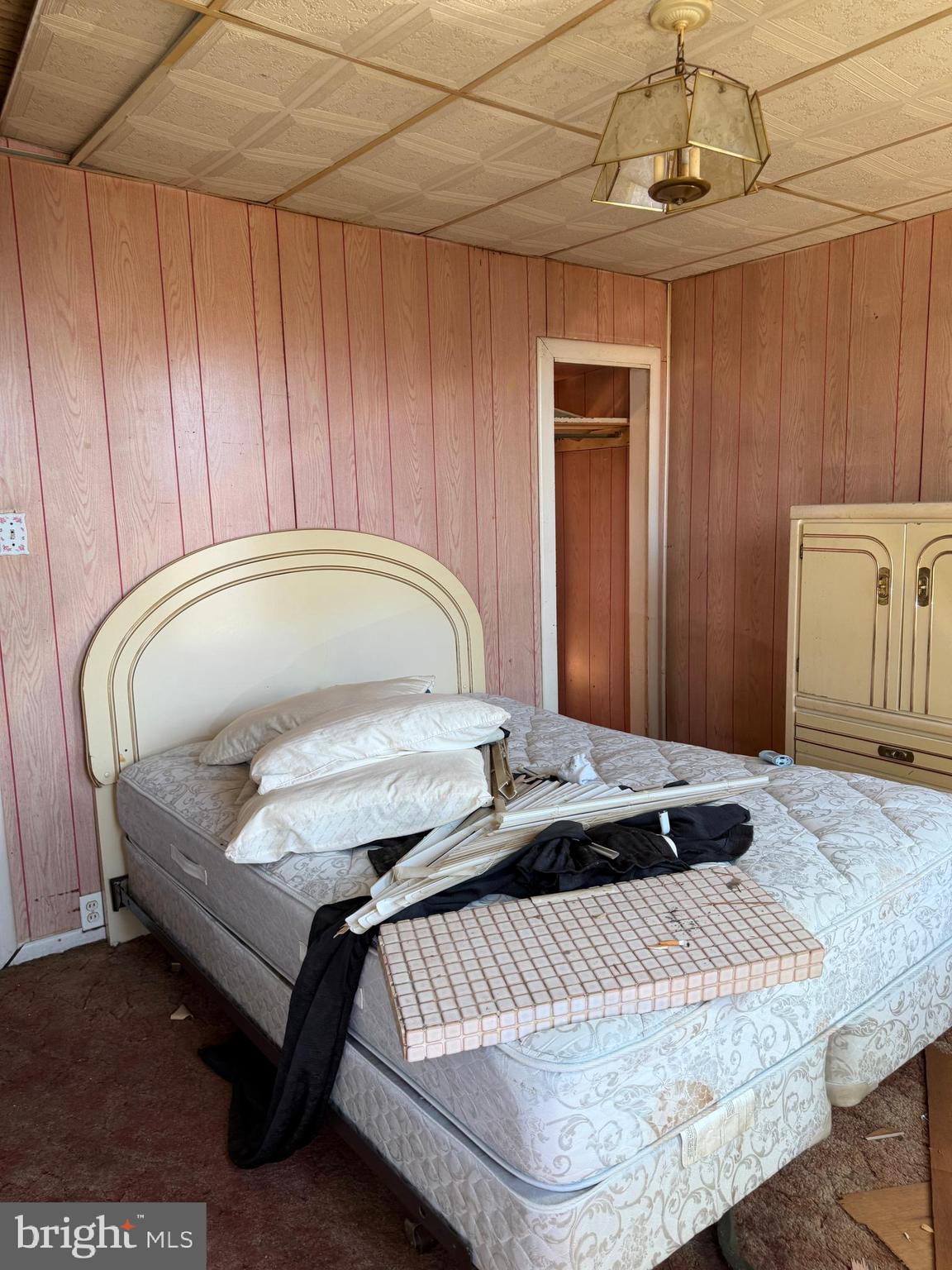 2373 Duncan Street Philadelphia, PA 19124 - Photo 8 of 15 a bed sitting in a spacious bedroom next to a window