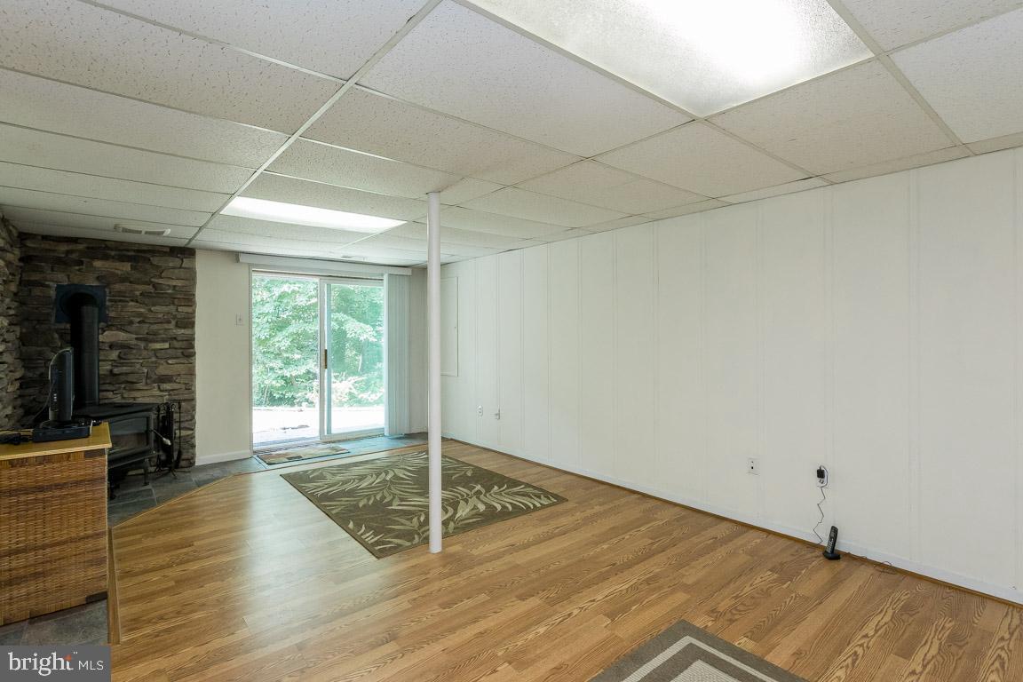 262 Peninsula Farm Road Arnold, MD 21012 - Photo 29 of 47 Family room with wood stove