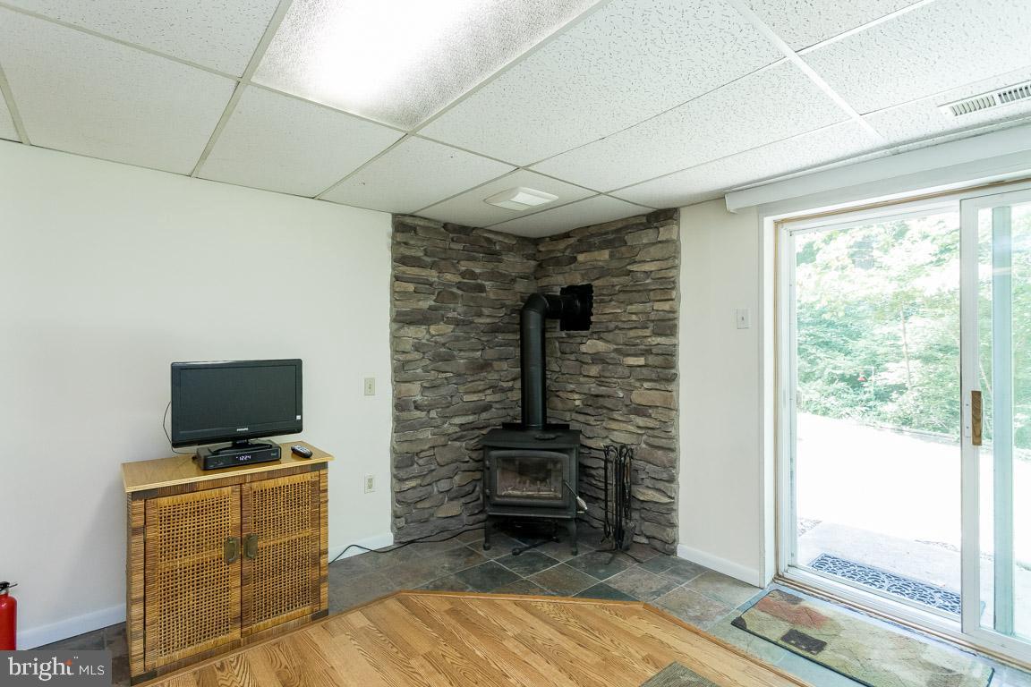262 Peninsula Farm Road Arnold, MD 21012 - Photo 32 of 47 Family room wood stove
