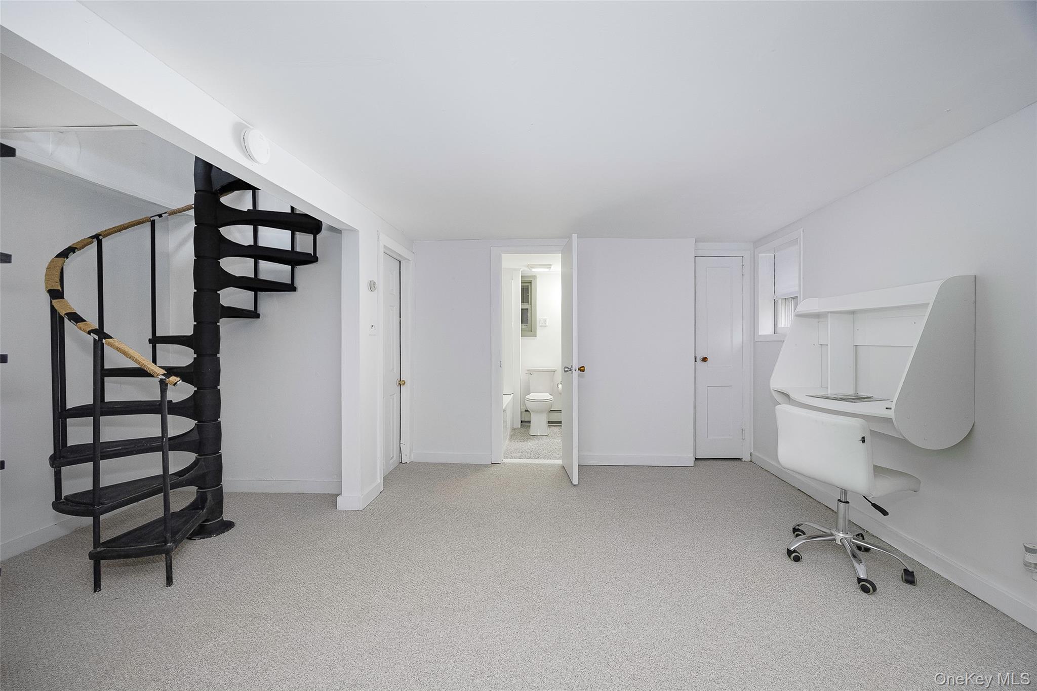 475 East Kerley Corners Road Tivoli, NY 12583 - Photo 19 of 31 a view of an empty room with stairs and white cabinet