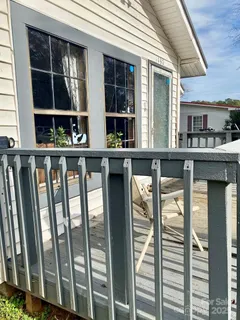 a front view of a house with glass windows