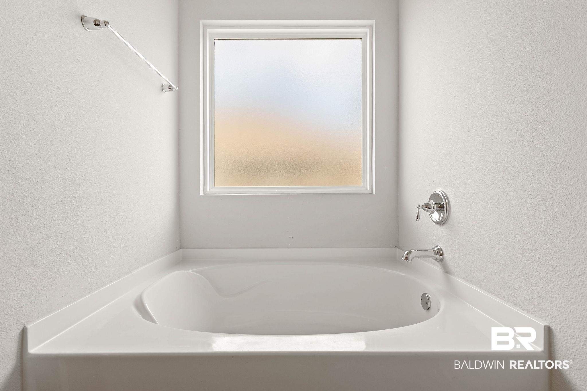 9448 Amethyst Drive Daphne, AL 36526 - Photo 29 of 61 Full bathroom featuring a textured wall and a bath