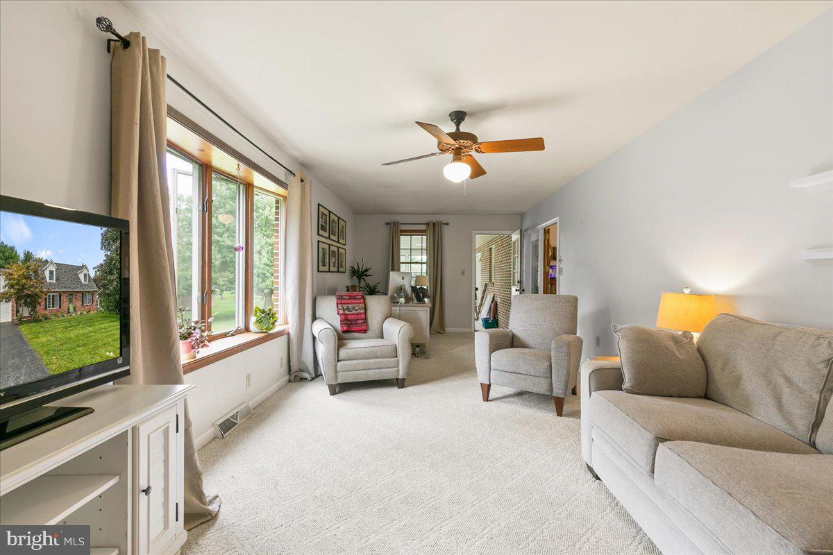 44 Green Acre Road Lititz, PA 17543 - Photo 11 of 66 a living room with furniture and a flat screen tv