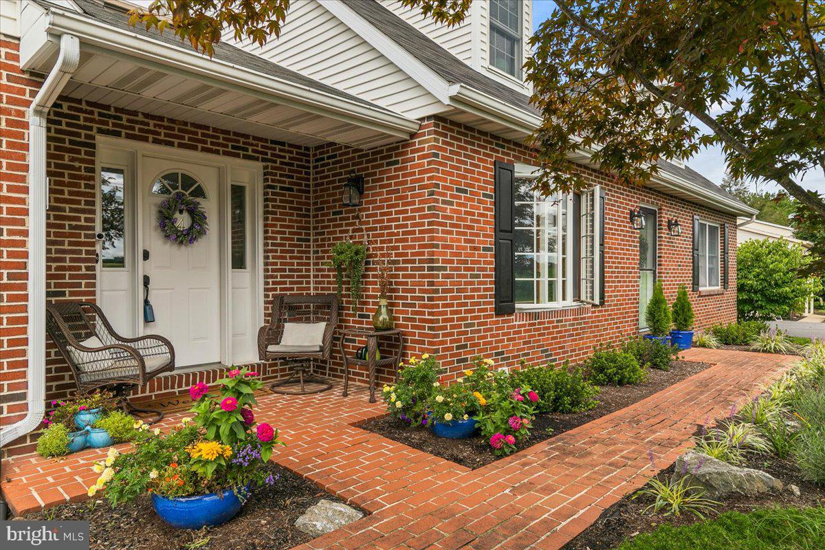 44 Green Acre Road Lititz, PA 17543 - Photo 3 of 66 Welcoming covered formal entry w brick walkways.