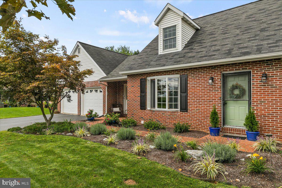 44 Green Acre Road Lititz, PA 17543 - Photo 4 of 66 a front view of a house with garden
