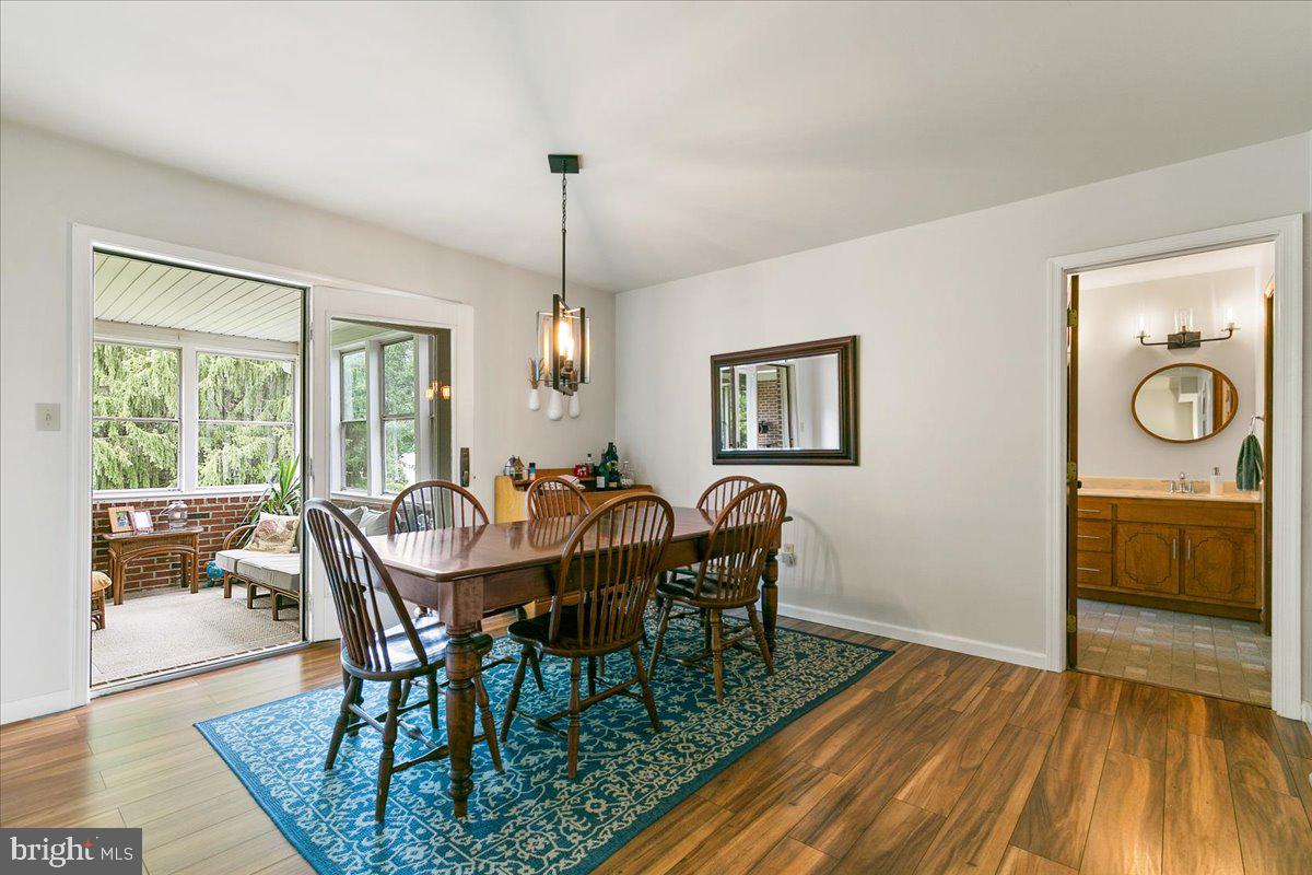 44 Green Acre Road Lititz, PA 17543 - Photo 33 of 66 a view of a dining room with furniture window and wooden floor