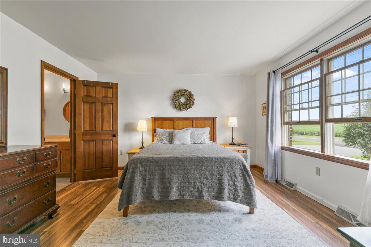 44 Green Acre Road Lititz, PA 17543 - Photo 39 of 66 a bedroom with a bed and a dresser next to a window