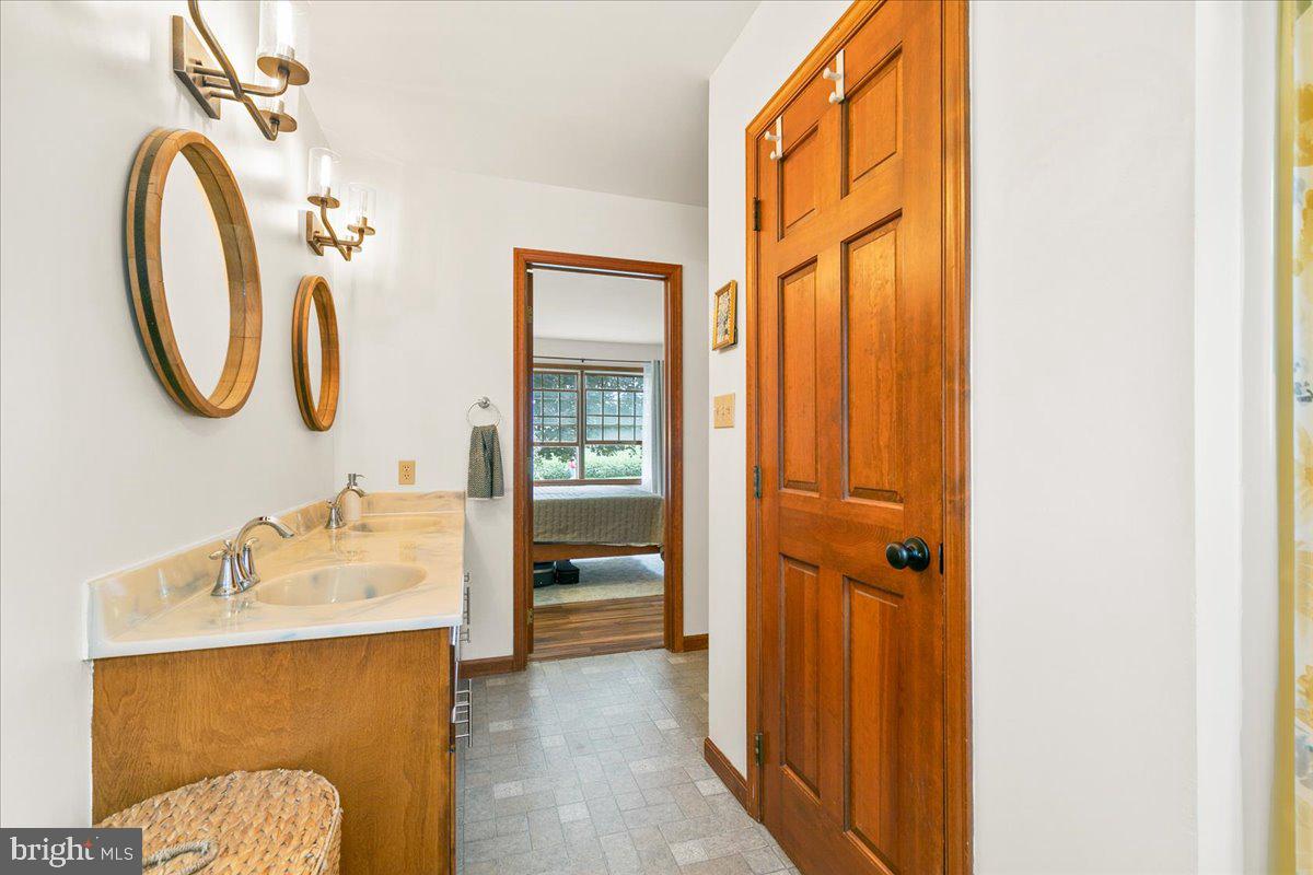 44 Green Acre Road Lititz, PA 17543 - Photo 44 of 66 a bathroom with a sink and a mirror