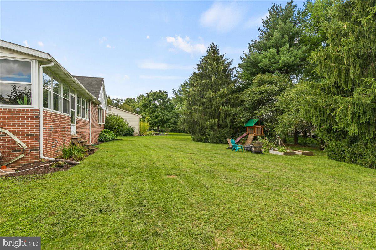 44 Green Acre Road Lititz, PA 17543 - Photo 64 of 66 a view of a house with a yard and sitting area