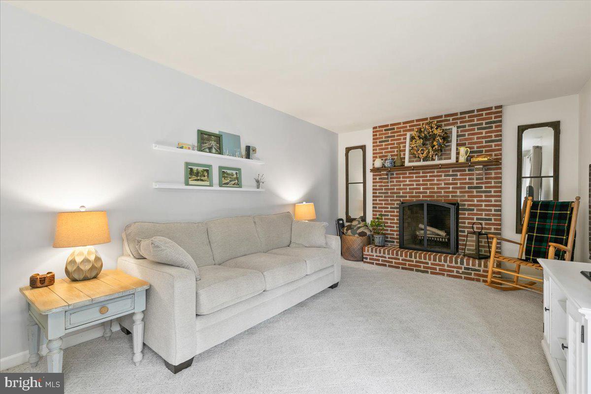 44 Green Acre Road Lititz, PA 17543 - Photo 9 of 66 Family Room has fireplace for cozy winter evenings