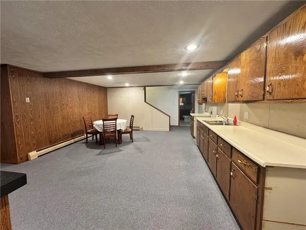 a view of a livingroom with gym equipment