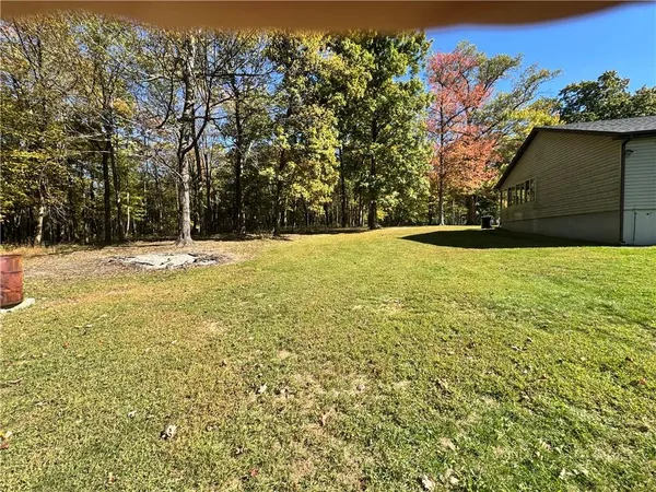 a view of an outdoor space and a yard