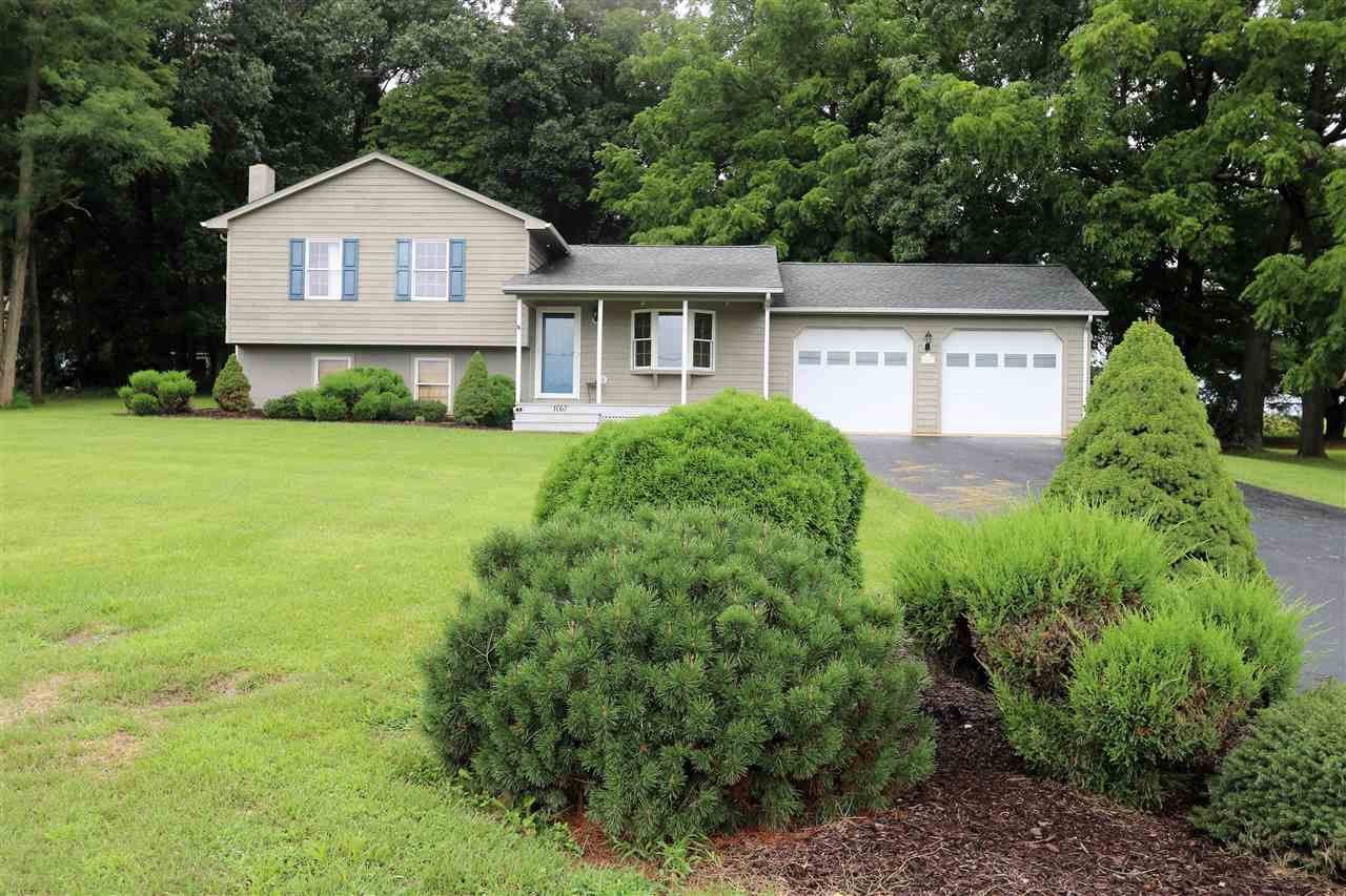 1067 Madrid Road Waynesboro, VA 22980 - Photo 1 of 48 a front view of a house with a yard and trees