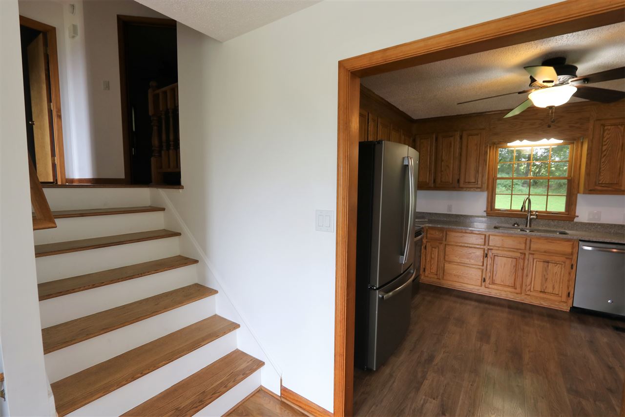 1067 Madrid Road Waynesboro, VA 22980 - Photo 13 of 48 a kitchen with a refrigerator and a sink