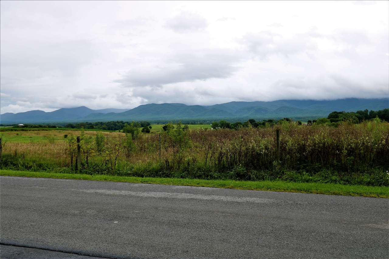 1067 Madrid Road Waynesboro, VA 22980 - Photo 2 of 48 a view of a yard and a lake view