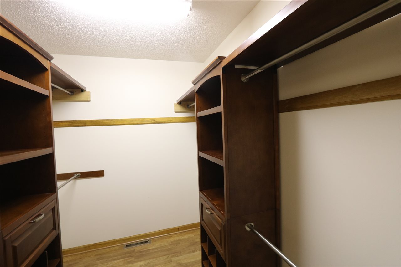 1067 Madrid Road Waynesboro, VA 22980 - Photo 24 of 48 a view of walk in closet with wooden floor