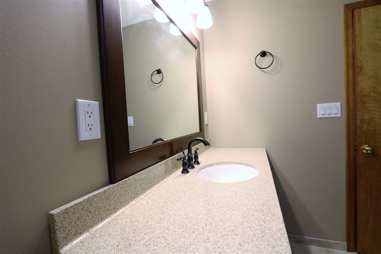 1067 Madrid Road Waynesboro, VA 22980 - Photo 30 of 48 a bathroom with a sink and mirror