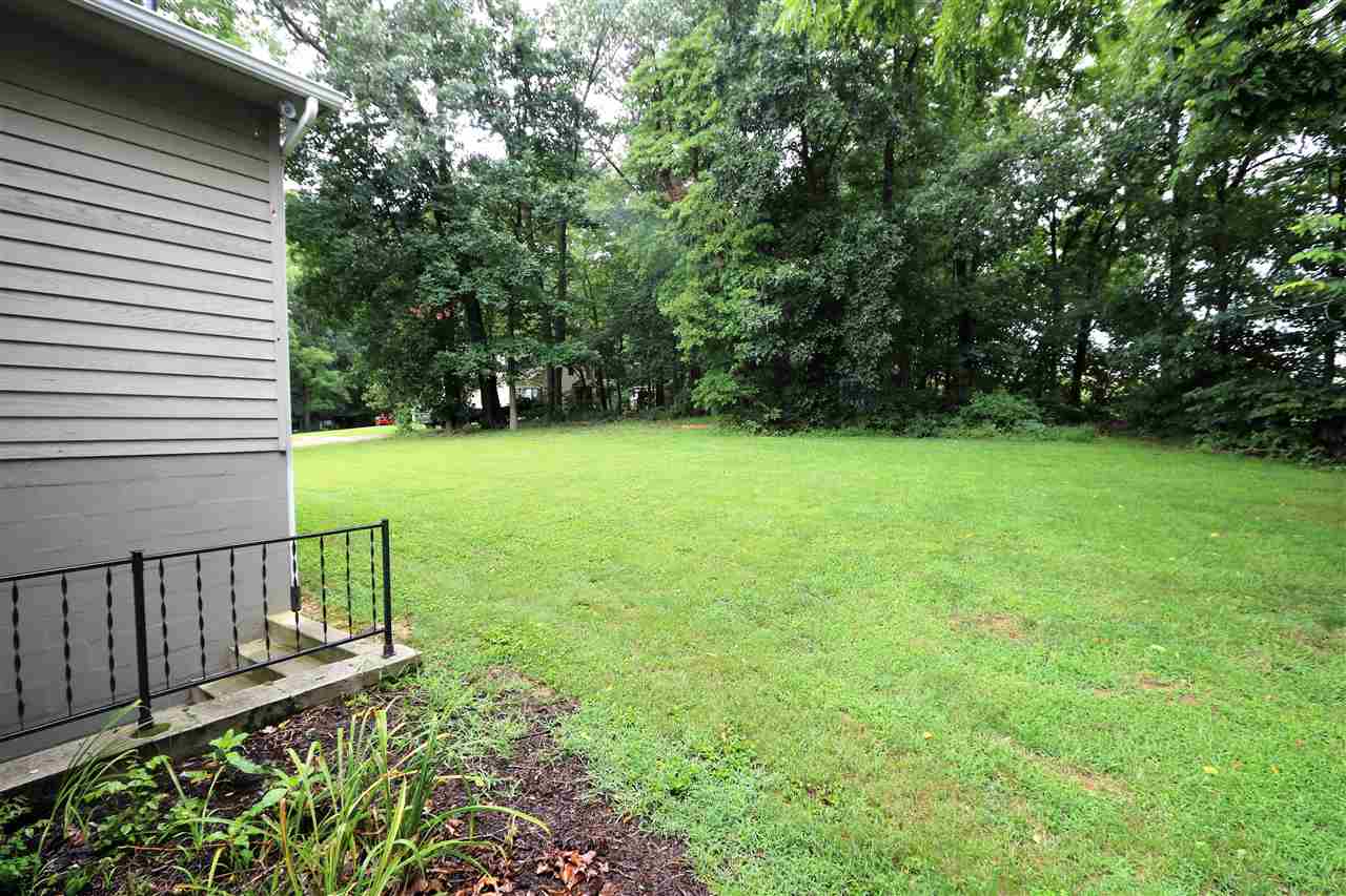 1067 Madrid Road Waynesboro, VA 22980 - Photo 3 of 48 a view of a backyard with a small cabin