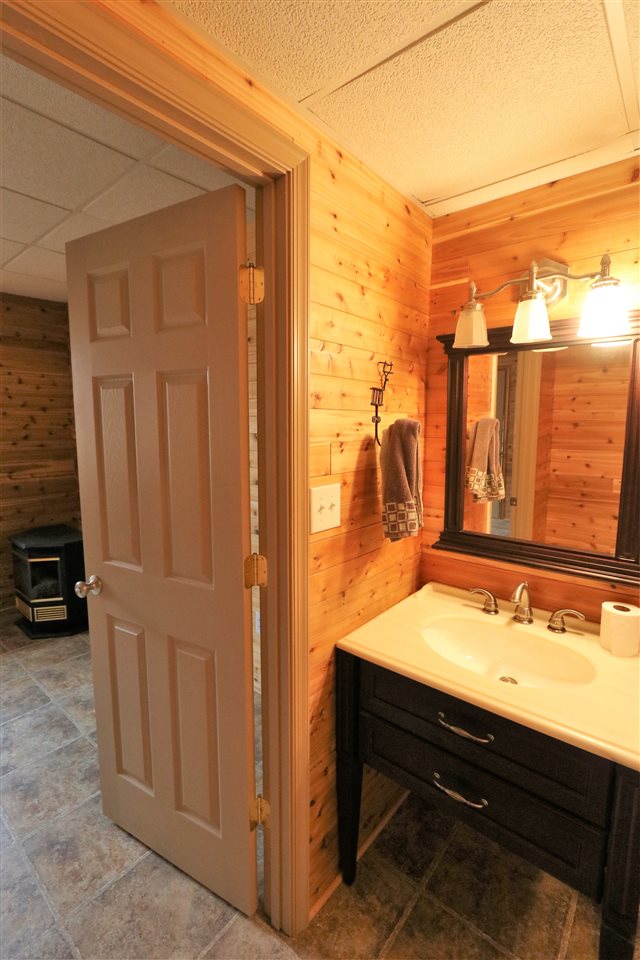 1067 Madrid Road Waynesboro, VA 22980 - Photo 37 of 48 a bathroom with a sink and a mirror