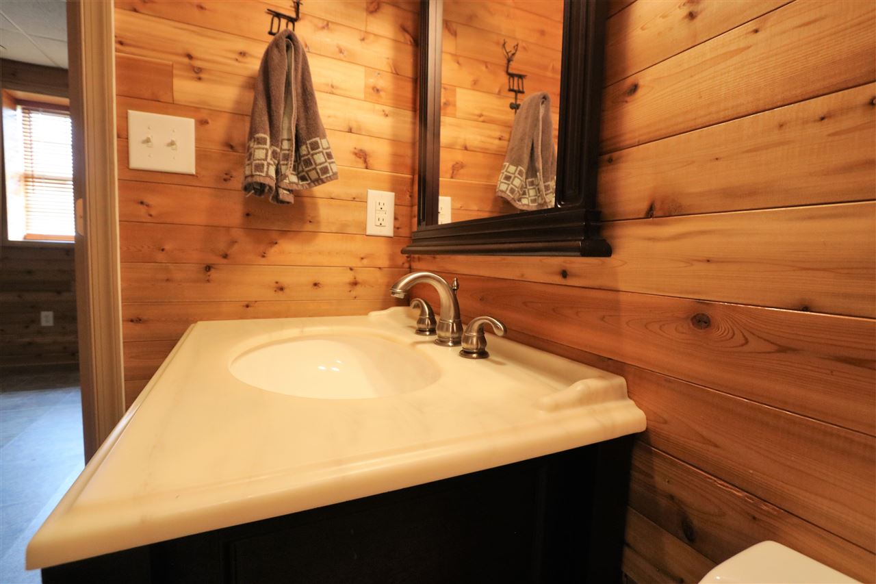 1067 Madrid Road Waynesboro, VA 22980 - Photo 38 of 48 a bathroom with a sink and a mirror