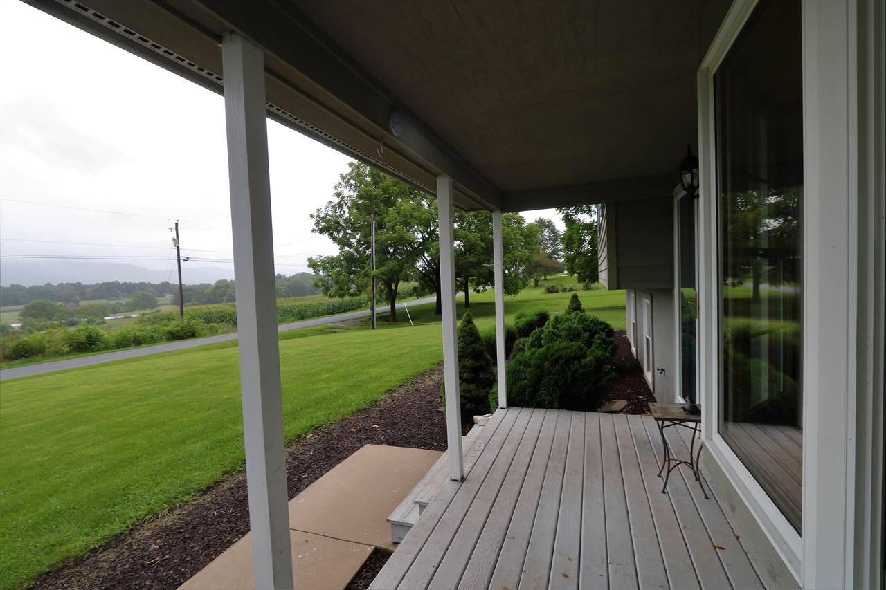 1067 Madrid Road Waynesboro, VA 22980 - Photo 4 of 48 a view of a porch with a yard