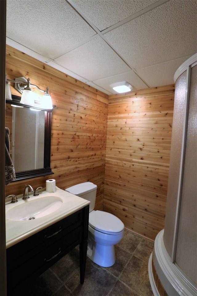 1067 Madrid Road Waynesboro, VA 22980 - Photo 41 of 48 a bathroom with a sink mirror vanity and toilet