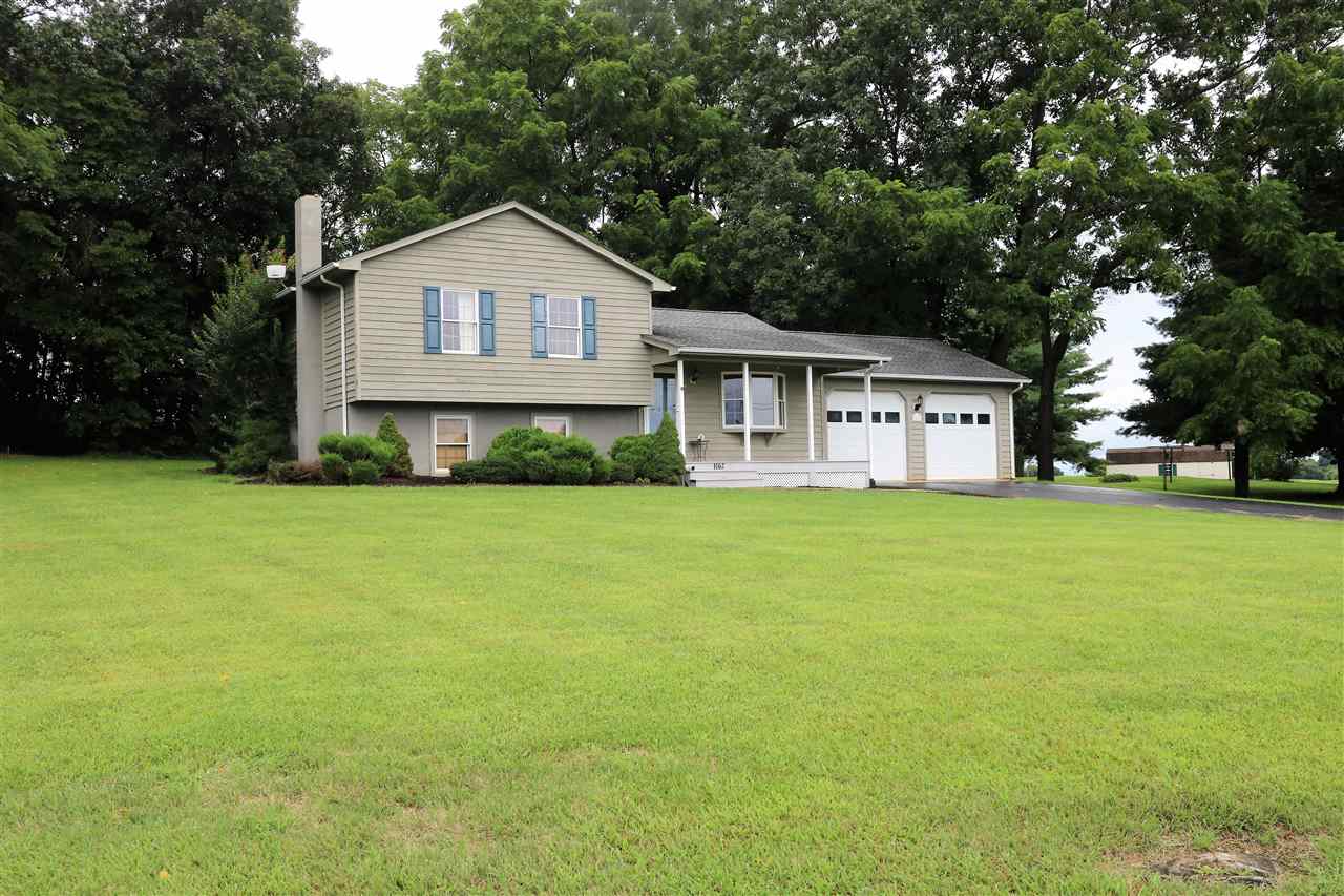 1067 Madrid Road Waynesboro, VA 22980 - Photo 45 of 48 a view of house with a big yard and large trees