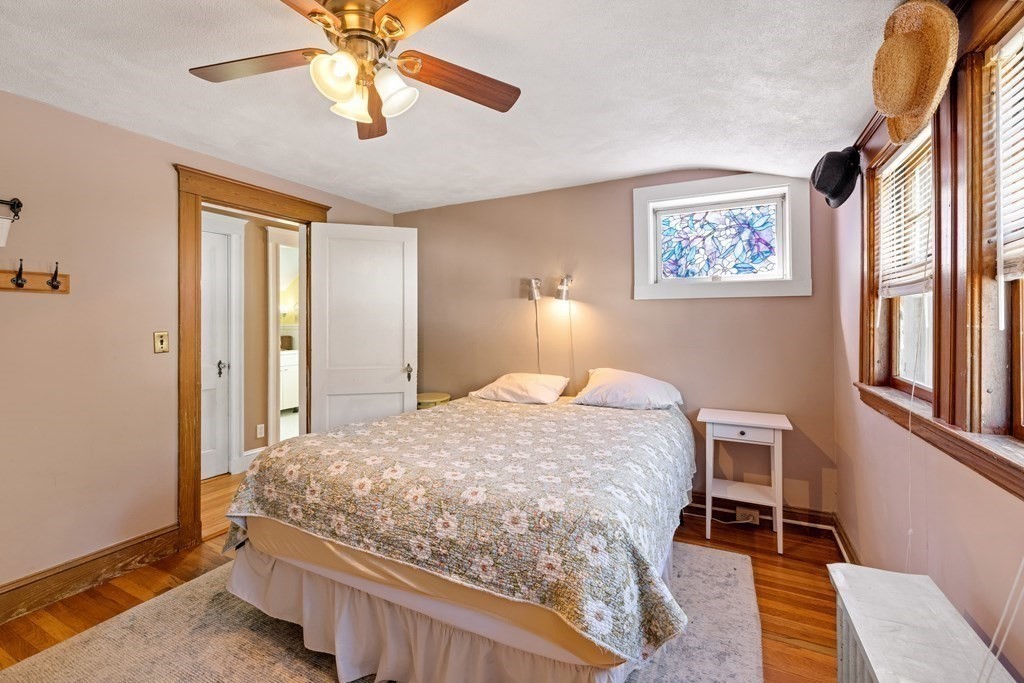 10 Bowker Street Lexington, MA 02421 - Photo 17 of 24 a bedroom with a bed and a window