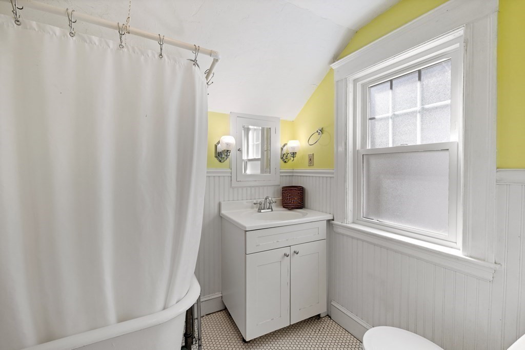 10 Bowker Street Lexington, MA 02421 - Photo 20 of 24 a bathroom with a sink toilet and tub