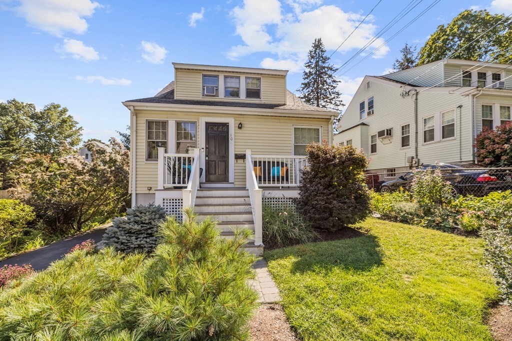 10 Bowker Street Lexington, MA 02421 - Photo 2 of 24 a front view of a house with a yard