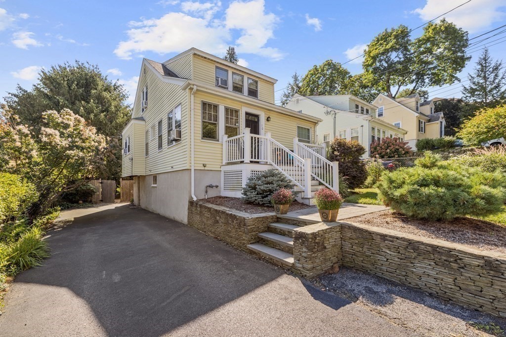 10 Bowker Street Lexington, MA 02421 - Photo 24 of 24 a front view of a house with a yard