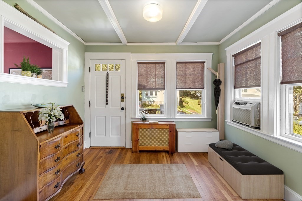 10 Bowker Street Lexington, MA 02421 - Photo 3 of 24 a bedroom with furniture and a window