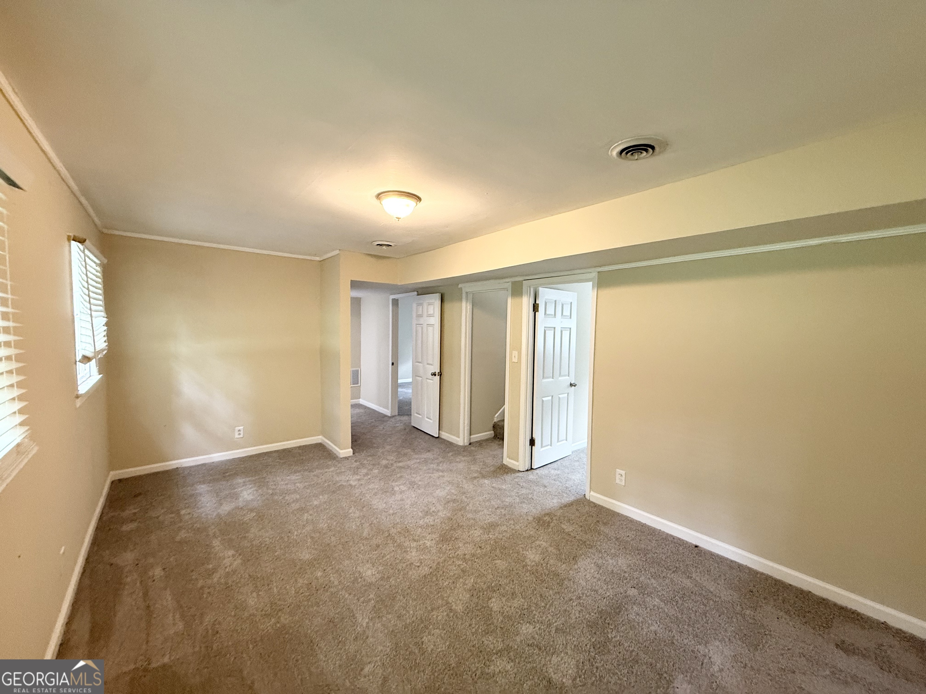 2782 Ocean Valley Road Atlanta, GA 30349 - Photo 18 of 27 a view of an empty room with a window
