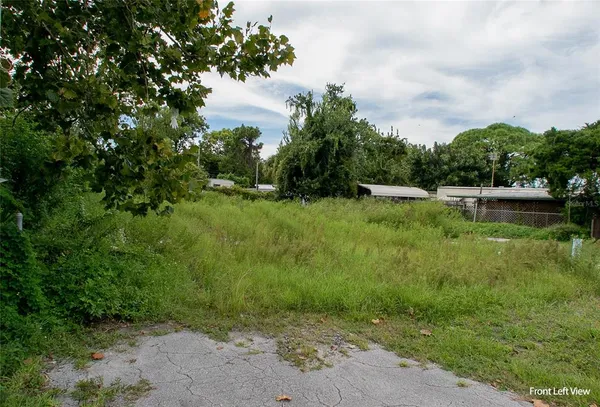 a view of outdoor space with deck and yard