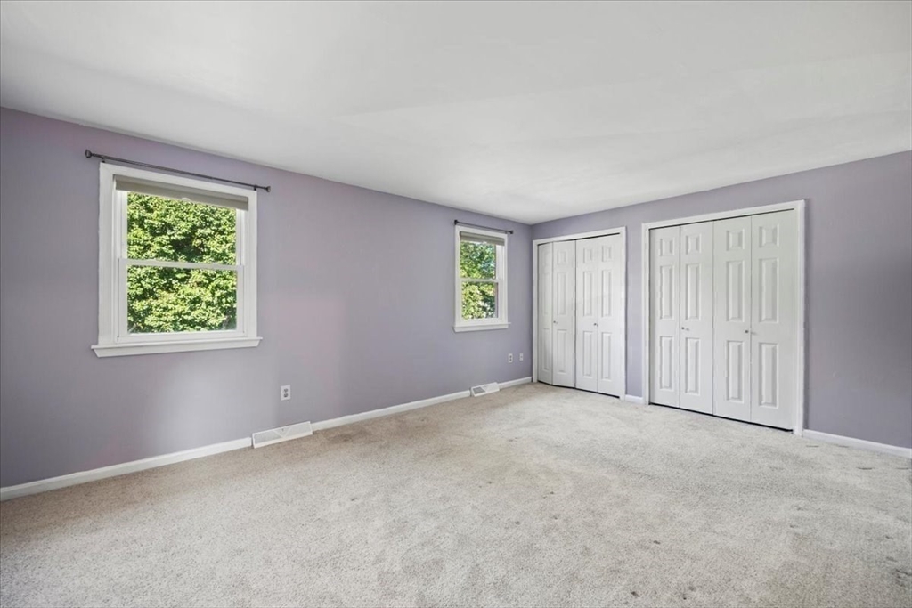 6 Robin Circle, Unit 1 Norton, MA 02766 - Photo 21 of 38 an empty room with windows