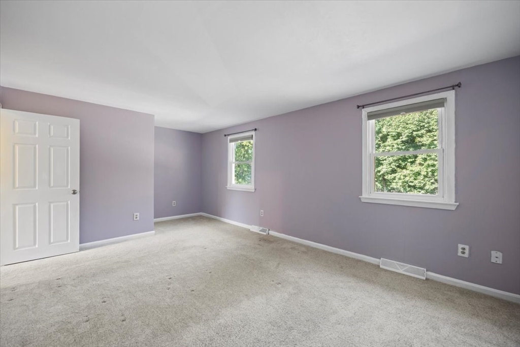 6 Robin Circle, Unit 1 Norton, MA 02766 - Photo 24 of 38 an empty room with windows