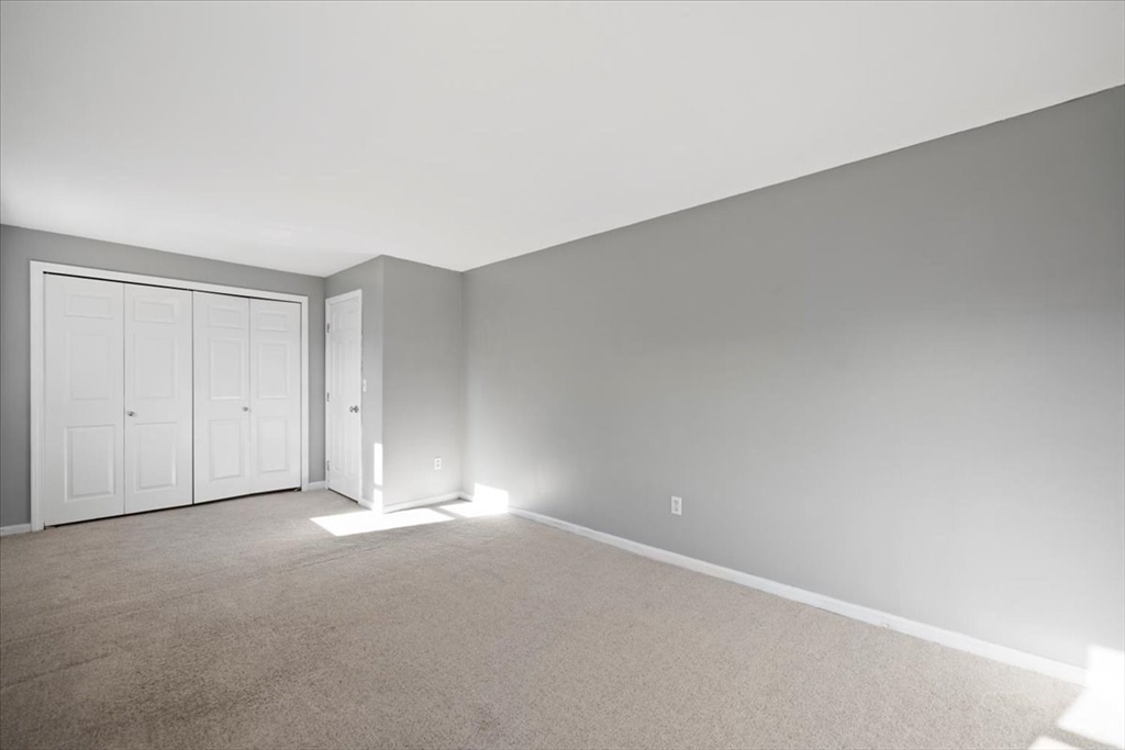 6 Robin Circle, Unit 1 Norton, MA 02766 - Photo 29 of 38 a view of an empty room and entryway